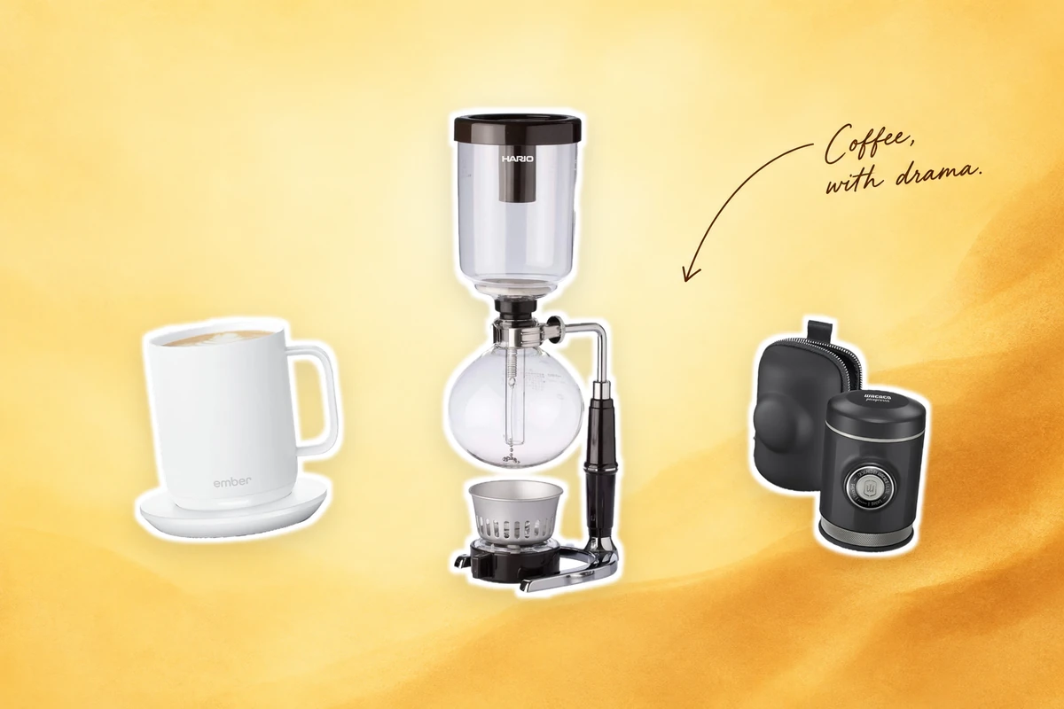 A HARIO glass coffee syphon between a white Ember mug and black WACACO Picopresso on a warm yellow and caramel background with a Coffee, with drama note