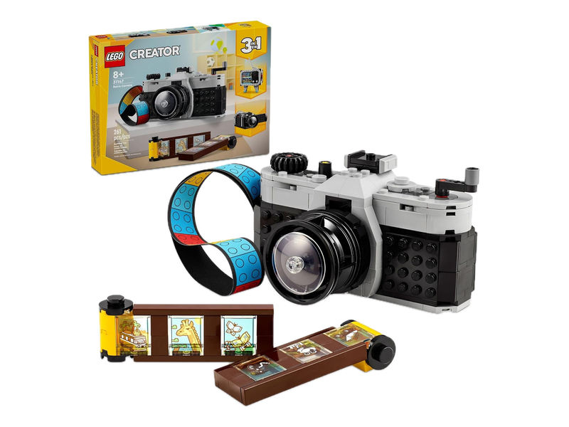LEGO Creator Retro Camera 31147 box beside the brick-built camera and decorative film strip