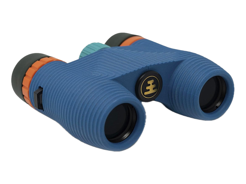 Blue Nocs Standard Issue binoculars with a ribbed grip, orange eyepiece accents and a green focus wheel