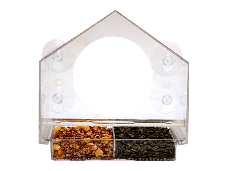 A clear Nature Anywhere window bird feeder with a peaked roof, suction cups, a viewing opening and a divided seed tray