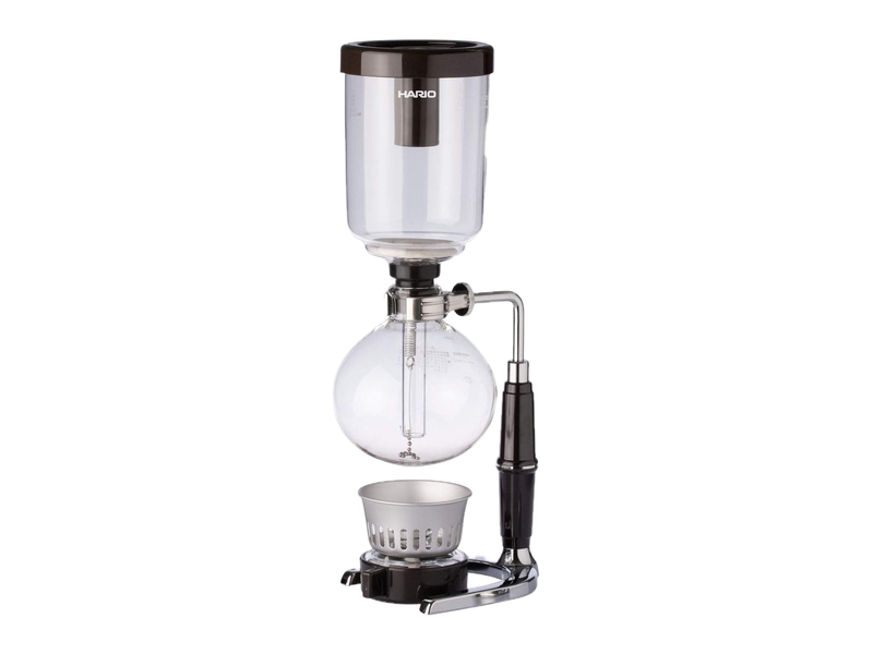 The HARIO Technica glass coffee syphon with two chambers, a black handle, metal stand and alcohol burner