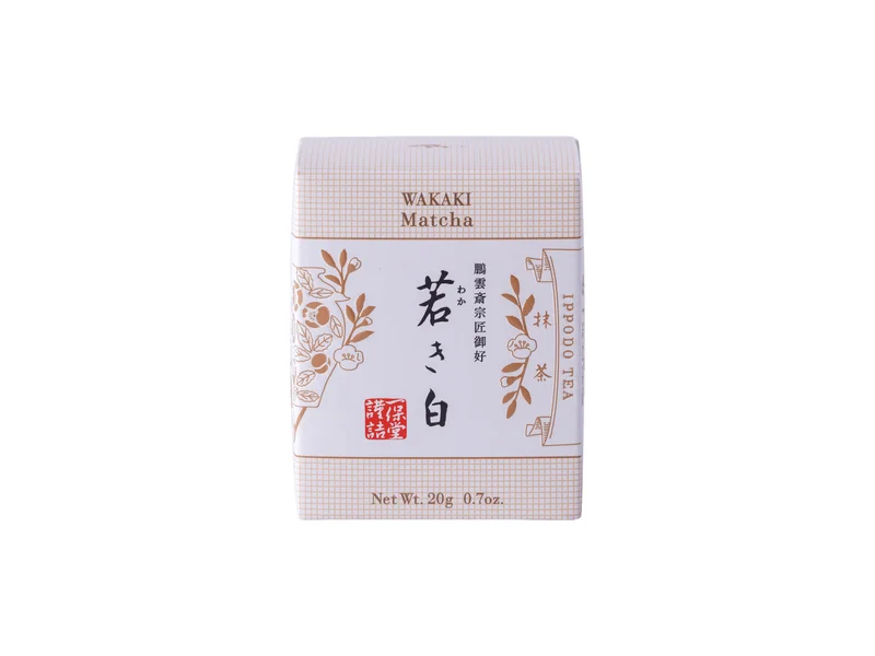 Unopened cream Ippodo Wakaki 20g matcha box with gold floral details