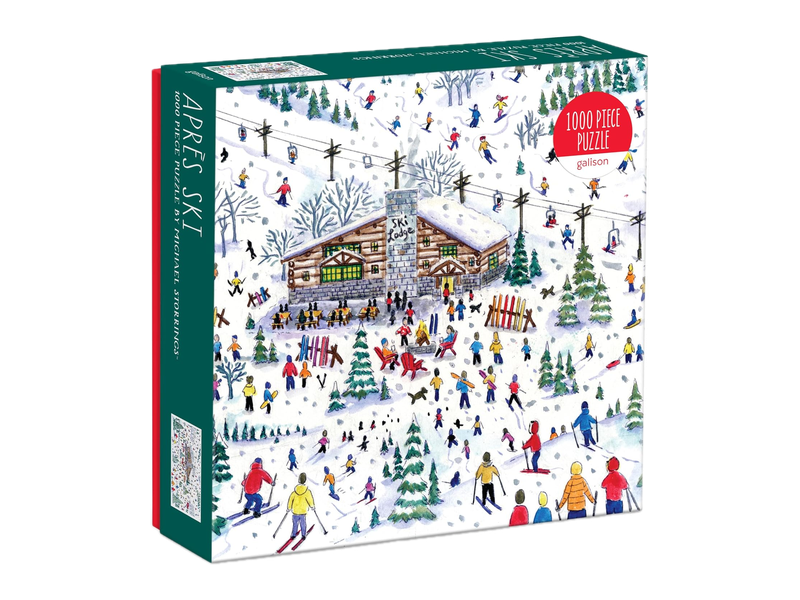 The green-edged Galison Après Ski puzzle box showing Michael Storrings's illustration of skiers and a busy lodge in the snow